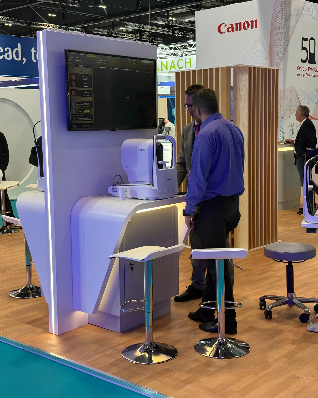 Canon ophthalmic product display with demonstration equipment on the ESCRS London 2026 exhibition stand