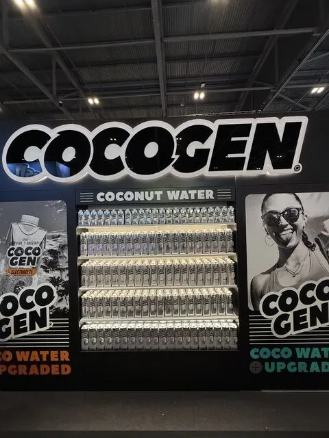 CocoGen coconut water product display with illuminated shelving and branded graphics at Lunch! 2026